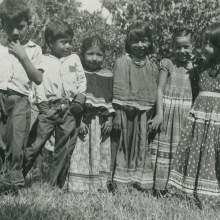 school children lined up at the Brighton Indian Day School. From left to right are James Frank (Texas) Tiger, Jim Shore, Nellie Smith, Josephine Huff, Elaine Johnson, and Lorene Bowers. 