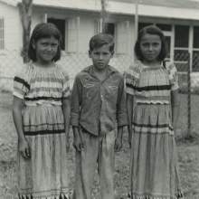  Leah Johns, Josiah Johns, and Edna Johns. The three children had perfect attendance at the Brighton Indian Day School and were rewarded with a trip to Miami.