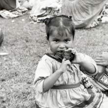 Mabel Johns eating lunch during a Field Day on the Brighton Reservation