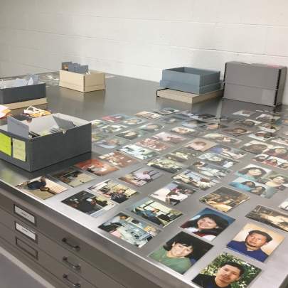 Thousands of photos need to be identified, organized, housed and labeled.